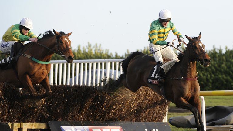 If in Doubt ridden by Tony McCoy (right) jumps the final fence as they win the Skybet Chase during day two of the Sky Bet Chase Weekend at Doncaster Raceco