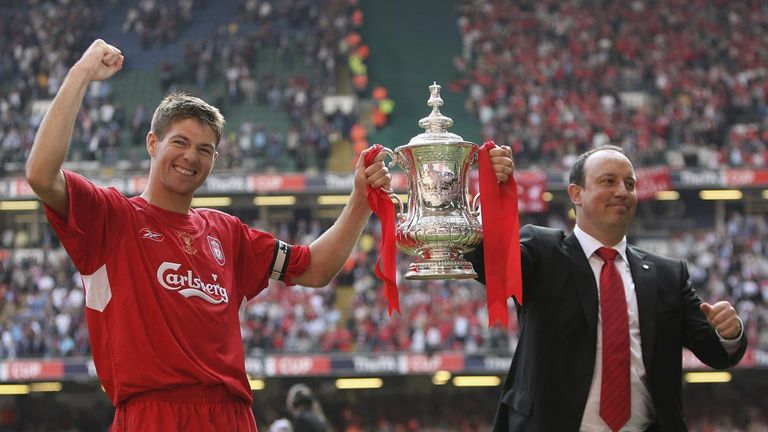 Liverpool captain Steven Gerrard with manager Rafael Benitez with the FA Cup after the FA Cup Final win over West Ham in May 2006
