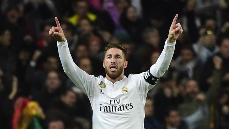 Real Madrid's defender Sergio Ramos celebrates after scoring against Atletico Madrid