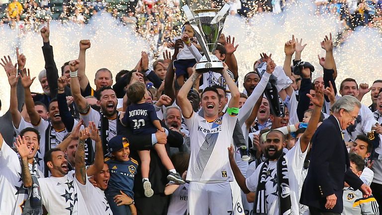 Robbie Keane lifts the MLS Cup for La Galaxy in 2014