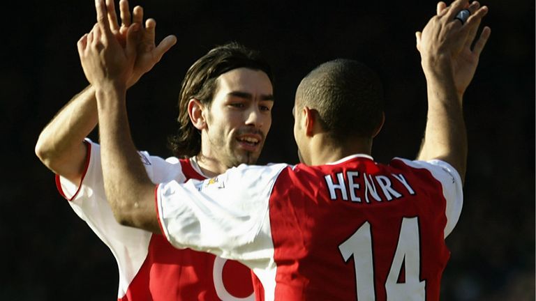 Thierry Henry celebrates with Robert Pires