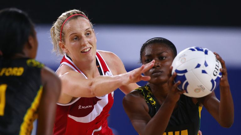 Sara Bayman of England and Jamaica's Khadijah Williams during the bronze medal netball match. 