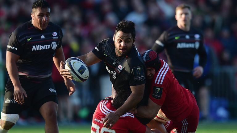  Billy Vunipola of Saracens is tackled by Ernst Joubert  of Munster during the European Rugby Champions Cup