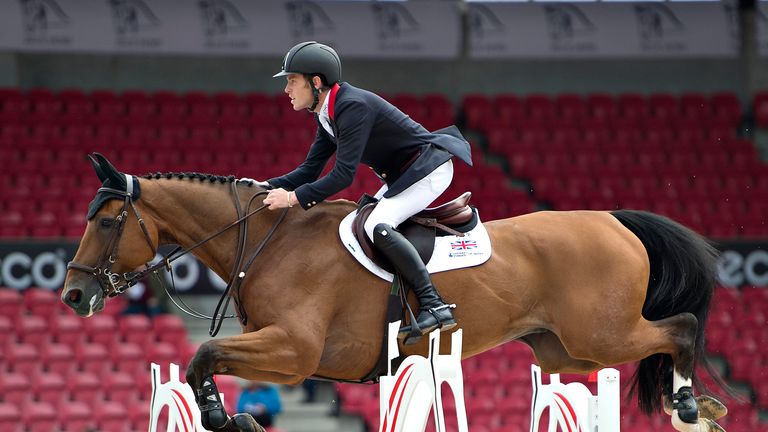 Britain's Scott Brash makes a jump on the horse Hello Sanctos during the FEI Horse Jumping European Championships in Herning, Denmark on August 21, 2013. B