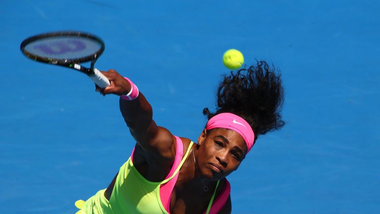 Serena Williams of the United States serves in her quarterfinal match against Dominika Cibulkova of Slovakia during day