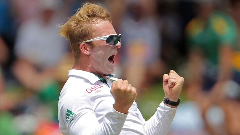 Simon Harmer celebrates one of his three wickets on debut