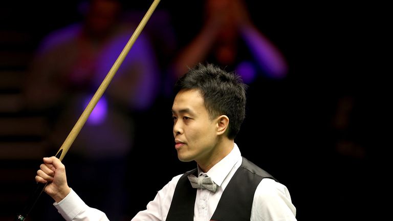 Marco Fu celebrates making a 147 break