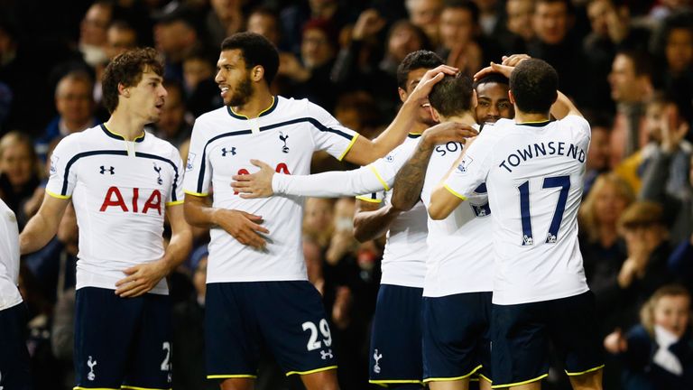 Danny Rose of Spurs (2R) celebrates with team mates