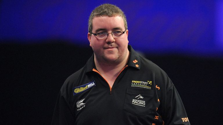 Stephen Bunting celebrates winning a leg during his match with Raymond van Barneveld during the William Hill World Darts Championship at Alexandra Palace, 