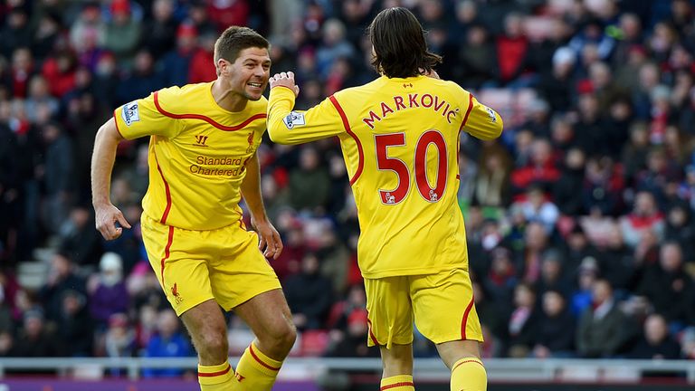  Lazar Markovic of Liverpool celebrates scoring the opening goal with Steven Gerrard 