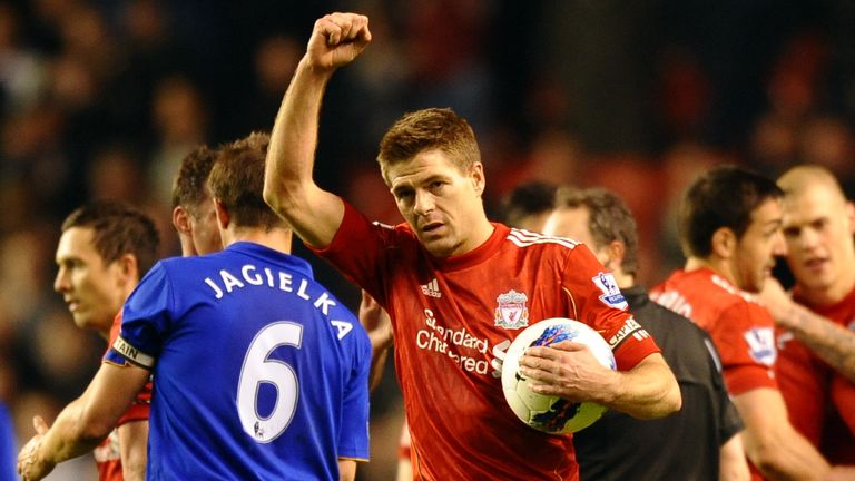 Liverpool's English midfielder Steven Gerrard celebrates his hat trick after the Premier League football match between Liverpool and Everton in 2012