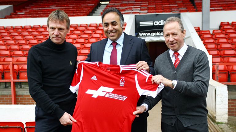 Stuart Pearce (L) holds a Forest shirt with club ambassador John McGovern (R) and Chairman Fawaz Al Hasawi