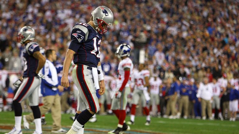 GLENDALE, AZ - FEBRUARY 03:  Quarterback Tom Brady #12 of the New England Patriots walks off the field after losing to the New York Giants 17-14 in Super B