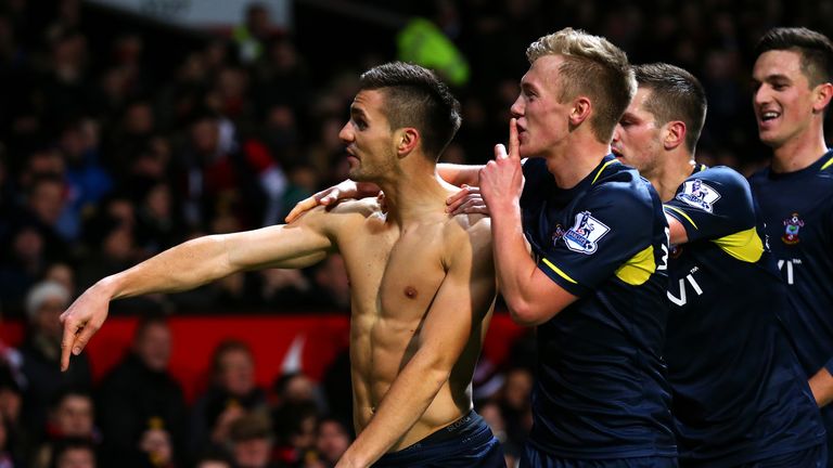 Dusan Tadic celebrates with team-mates after scoring the opening goal for Southampton.