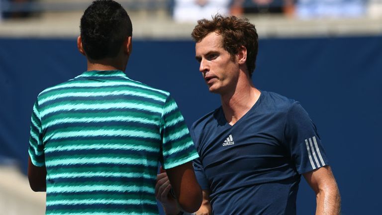 Andy Murray shakes hands with Nick Kyrgios oafter their match during Rogers Cup at Rexall Centre