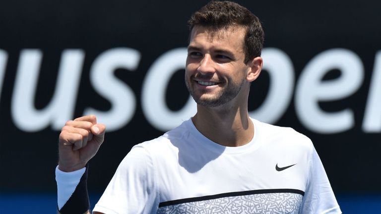 Grigor Dimitrov celebrates after victory against Dustin Brown during their match on day one of the 2015 Australian Open