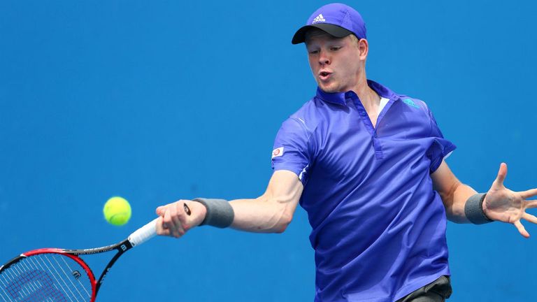 Kyle Edmund plays a forehand in his first round match against Steve Johnson during day two of the 2015 Australian Open