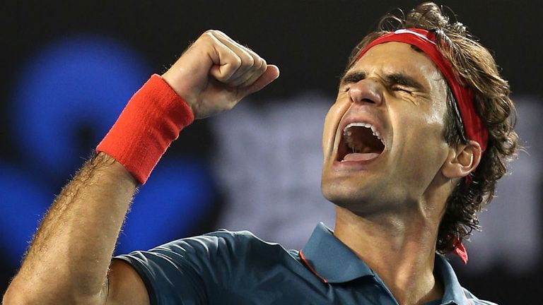 Roger Federer celebrates winning his quarter-final against Andy Murray at the 2014 Australian Open