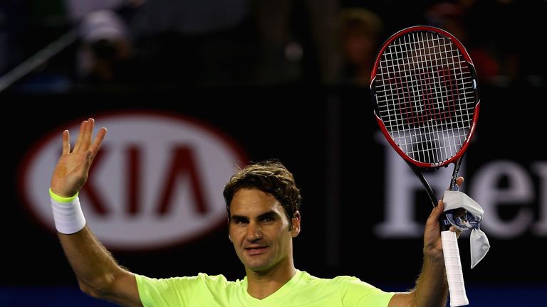MELBOURNE, AUSTRALIA - JANUARY 19:  Roger Federer of Switzerland waves to the crowd after victory in his first round match against Yen-Hsun Lu of Chinese T