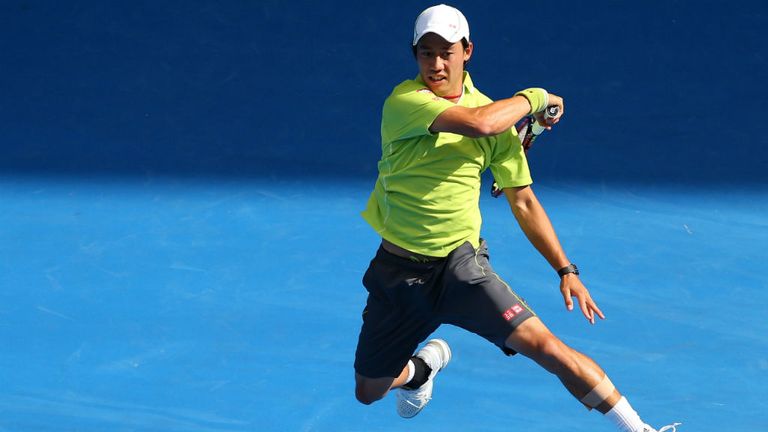 Kei Nishikori plays a shot during his match against David Ferrer at the 2015 Australian Open