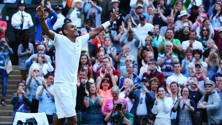 Nick Kyrgios celebrates match point and winning his Wimbledon fourth round match against Rafael Nadal