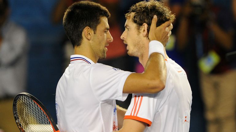 Novak Djokovic embraces opponent Andy Murray after victory in their 2012 Australian Open semi-final