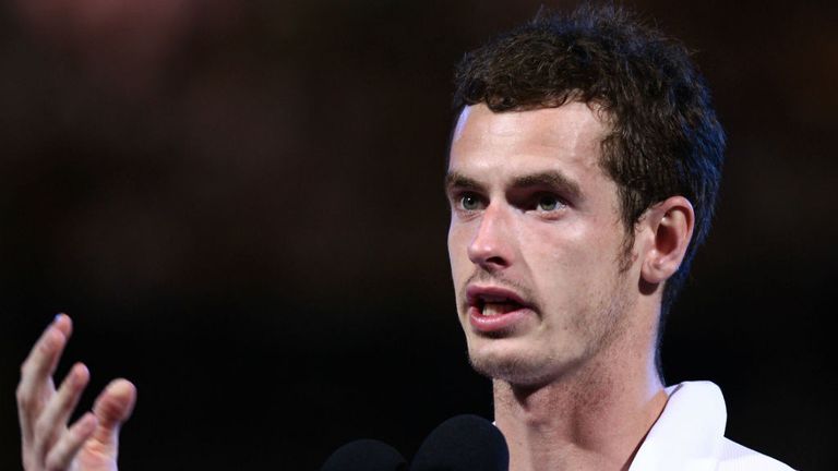 Andy Murray addresses the crowd during the 2010 Australian Open trophy presentation against Roger Federer