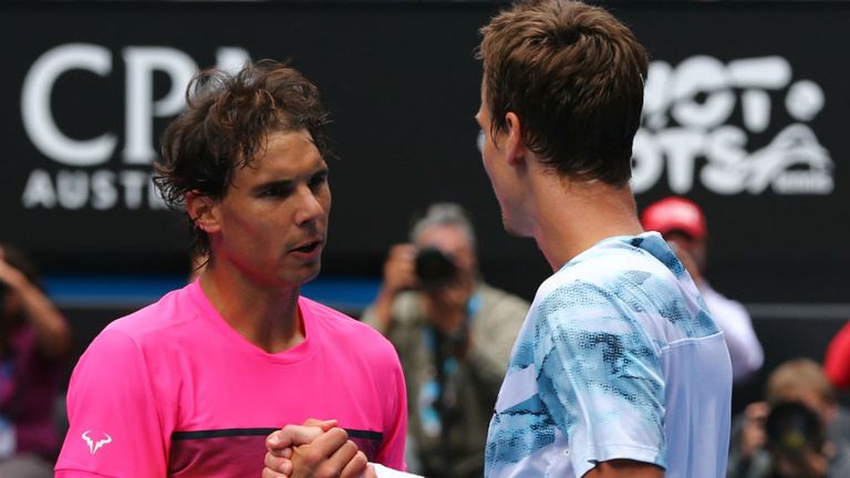 Rafael Nadal  and Tomas Berdych  at the net after Berdych won in their quarter-final match at the 2015 Australian Open