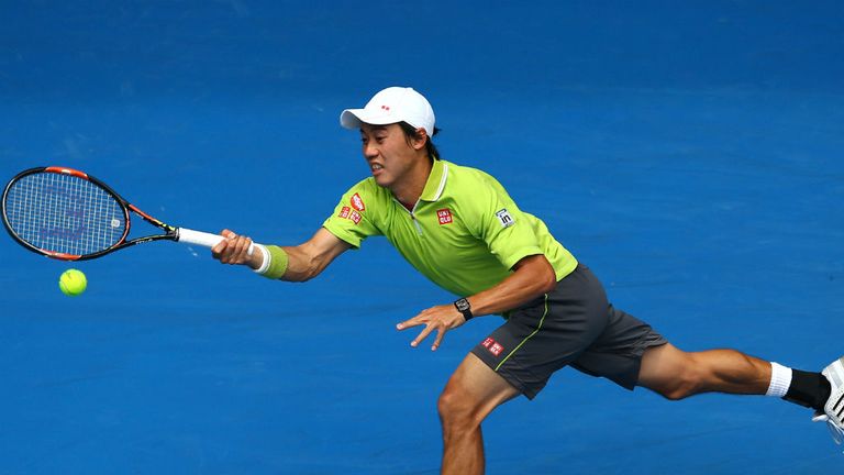 Kei Nishikori plays a forehand in his match against Nicolas Almagro during the 2015 Australian Open
