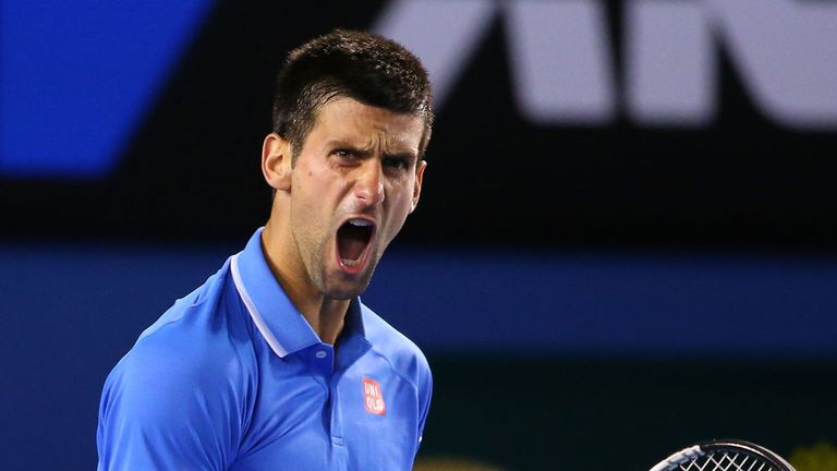 MELBOURNE, AUSTRALIA - JANUARY 30:  Novak Djokovic of Serbia celebrates a point in his semifinal match against Stanislas Wawrinka of Switzerland during day