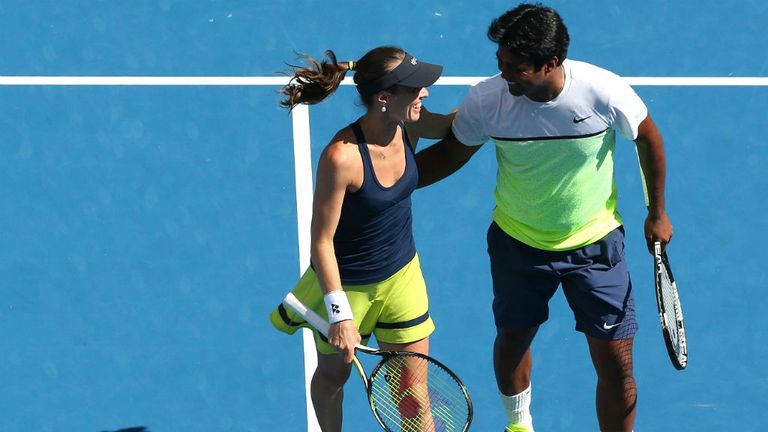 Martina Hingis and Leander Paes celebrate winning their semi-final mixed doubles match with against Su-Wei Hsieh
