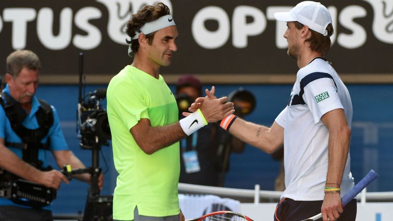 Roger Federer shakes hands with Andreas Seppi on day five of the 2015 Australian Open 