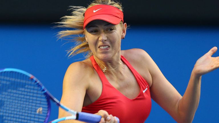 Maria Sharapova plays a forehand in her third round match against Zarina Diyas during the 2015 Australian Open 