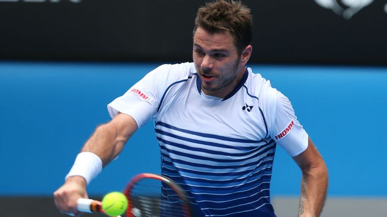 Stan Wawrinka plays a backhand in his first round match against Marsel Ilhan at the 2015 Australian Open 