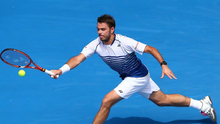 Stan Wawrinka plays a forehand in his first round match against Illya Marchenko during day two of the 2015 Australian Open 