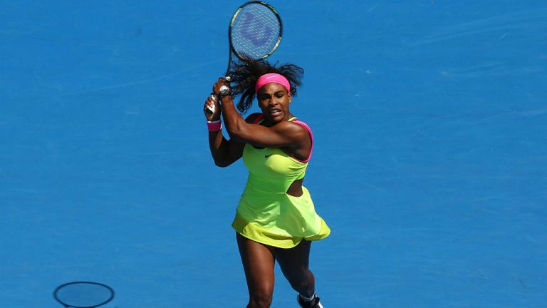Serena Williams lays a shot during her women's singles match against Garbine Muguruza at the 2015 Australian Open