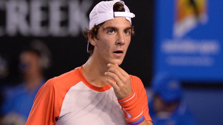 Aussie Thanasi Kokkinakis survived a four-hour marathon to reach round two in Melbourne