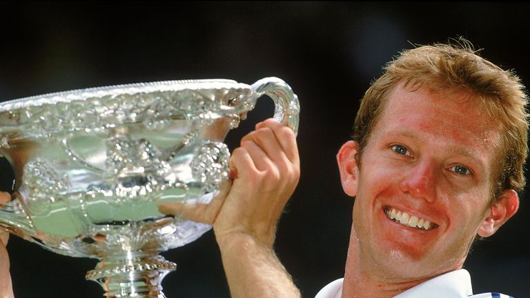 Thomas Johansson poses with the Australian Open trophy in 2002