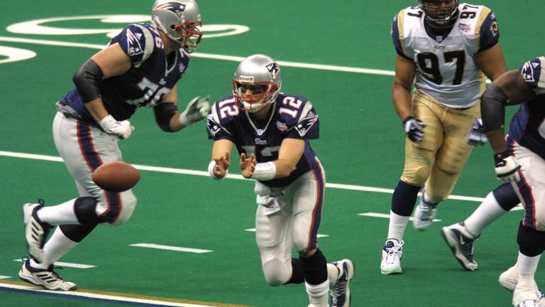 Quarterback Tom Brady #12 of the New England Patriots  passes the ball during the game against the St.Louis Rams at Superbowl XXXVI at the Su