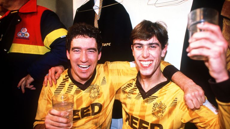 Tony Rains and Matthew Hanlan of Sutton celebrate after their FA Cup victory over Coventry City in 1989