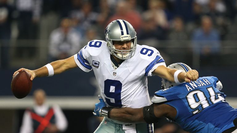 Romo of the Cowboys avoids the tackle of Ezekiel Ansah  of the Detroit Lions