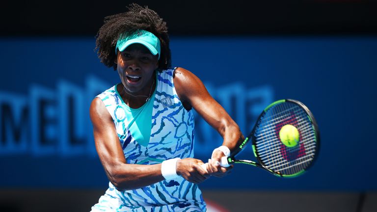 Venus Williams of the United States plays a backhand in her quarterfinal match against Madison Keys of the United State