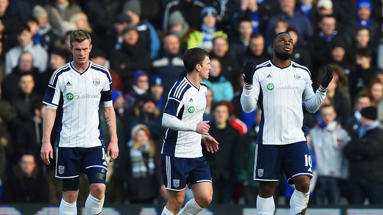 Victor Anichebe (R) of West Brom celebrates scoring the opening goal against Birmingham City
