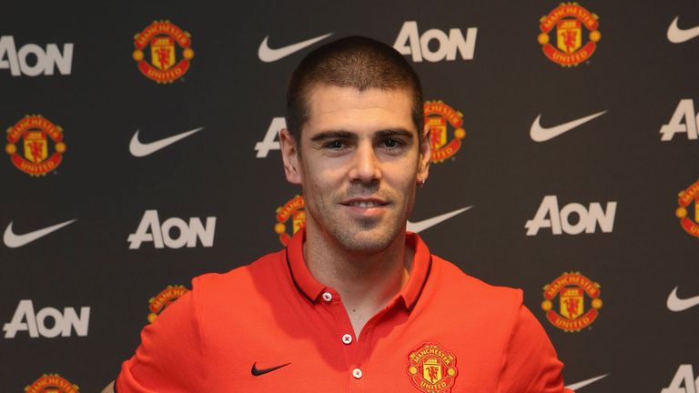 Victor Valdes of Manchester United poses after signing for the club at Aon Training Complex on January 8, 2015 in Manchester, England