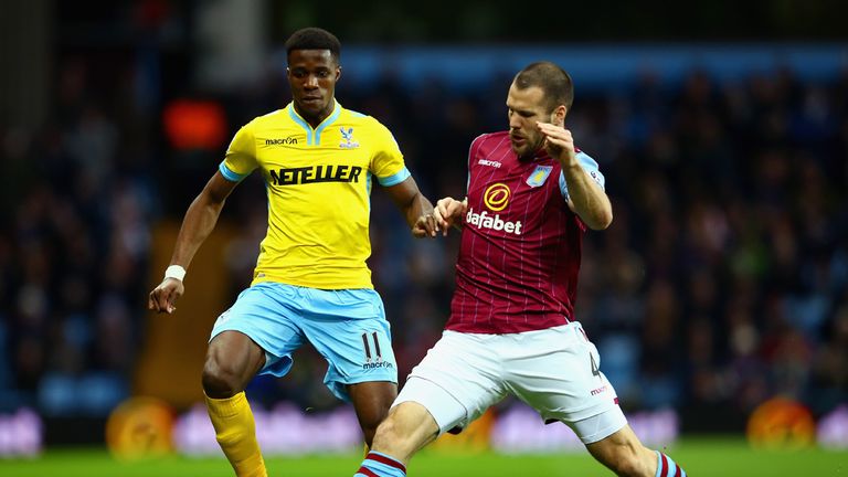Wilfried Zaha was tackled by Ron Vlaar as Crystal Palace held Aston Villa to a goalless draw