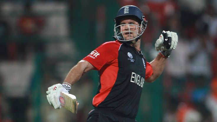 Andrew Strauss of England celebrates reaching his century during the 2011 ICC World Cup Group B match between India and England at M. Chinnaswamy Stadium