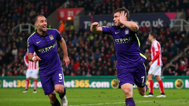 James Milner of Manchester City celebrates with team-mate Pablo Zabaleta