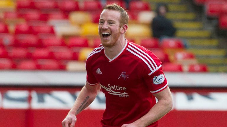 Aberdeen's Adam Rooney wheels away after putting his side 1-0 up