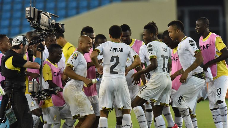 Ghana celebrate their delayed victory after crowd trouble