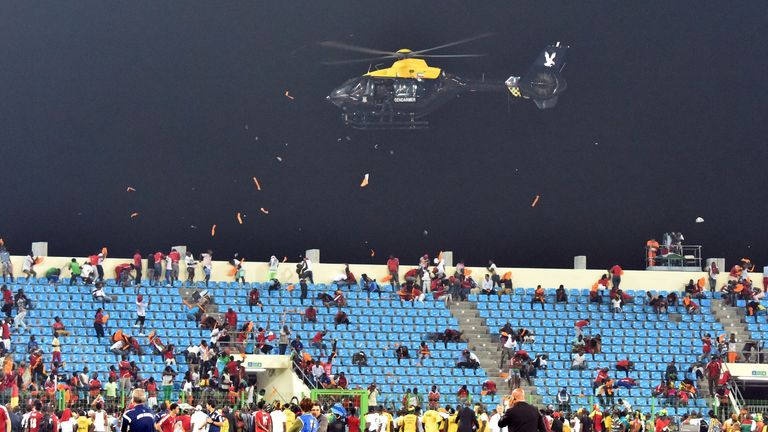 A police helicopter flew over the stadium as the authorities tried to diffuse the situation